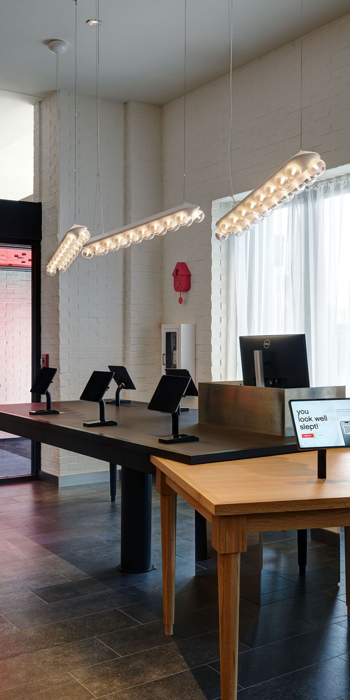 Interior view of hotel check-in kiosks