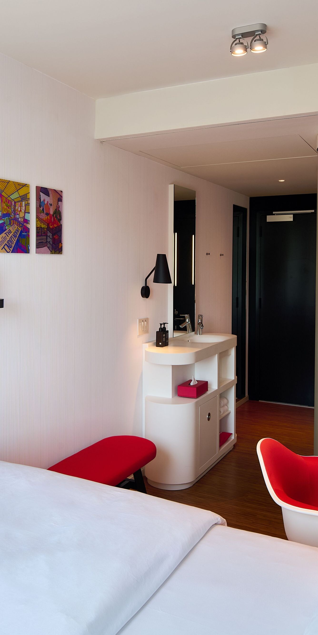 Guest room with flat-screened TV and desk