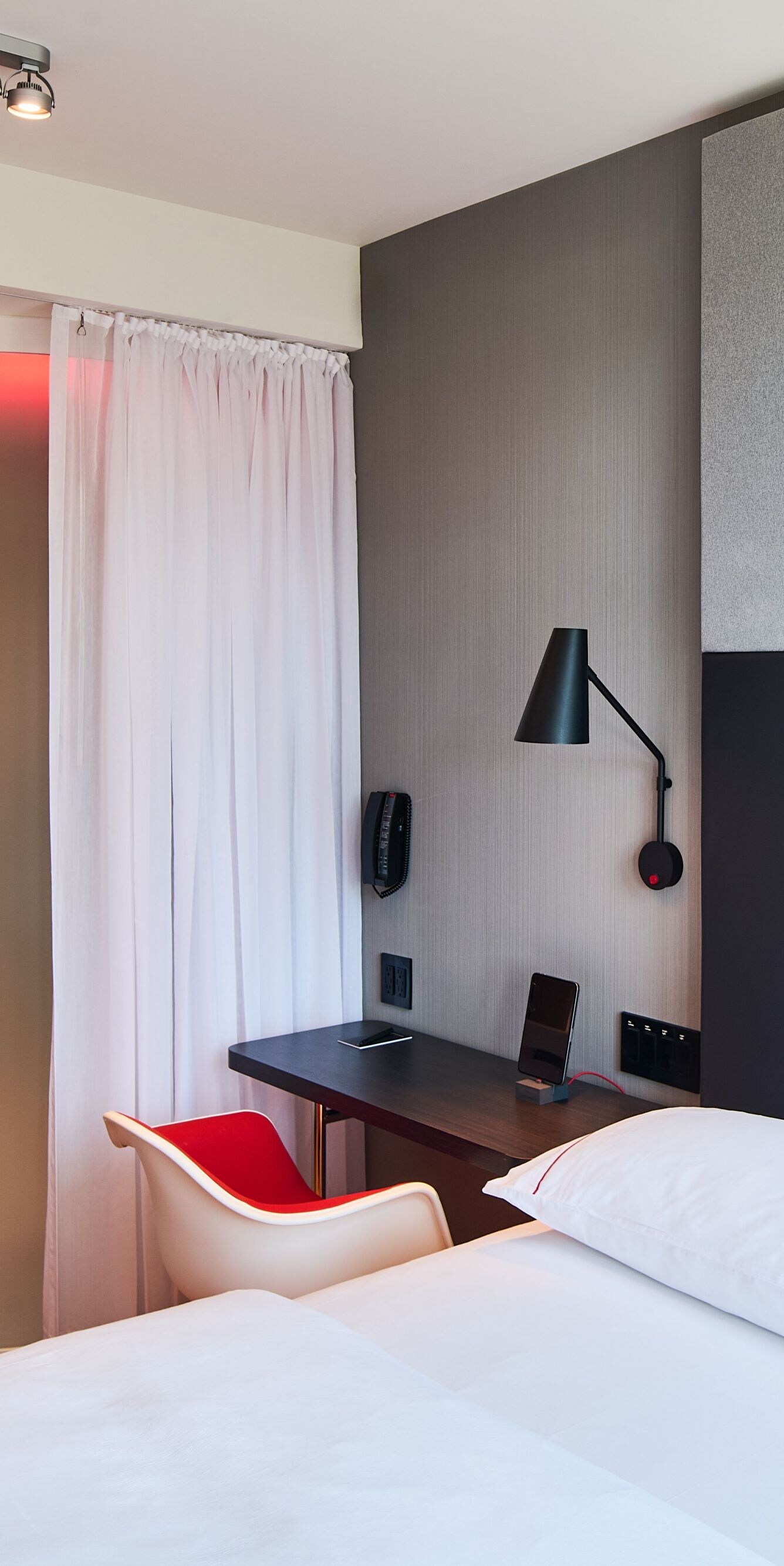 Guest room with a king-sized bed and desk