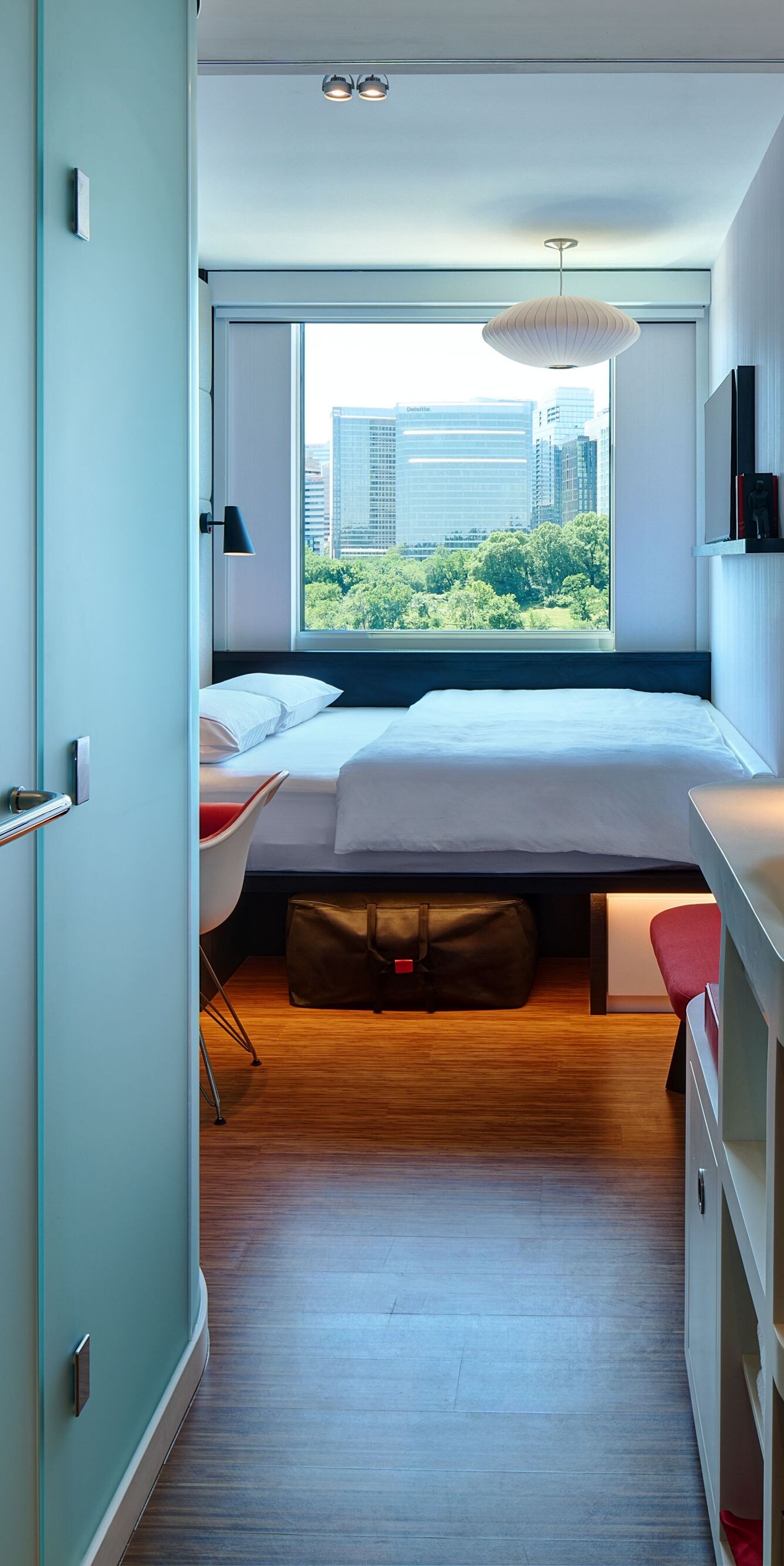 Guest room with a king-sized bed and bathroom