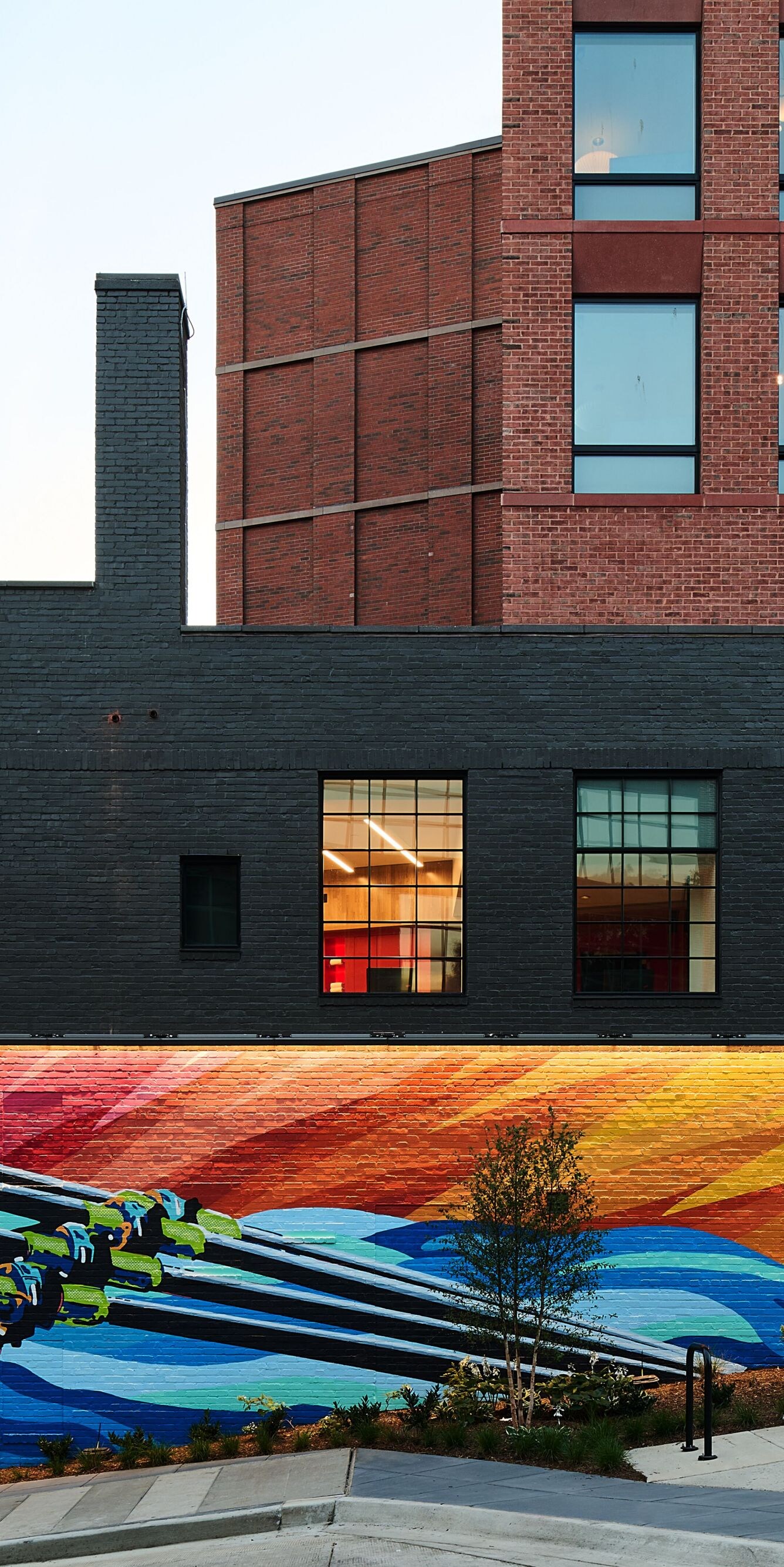 Exterior mural showcasing rowers on the Potomac