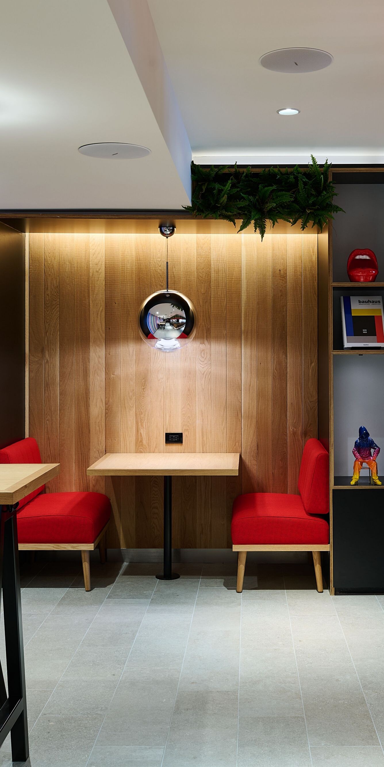 Dining with casual bar stools and booth tables
