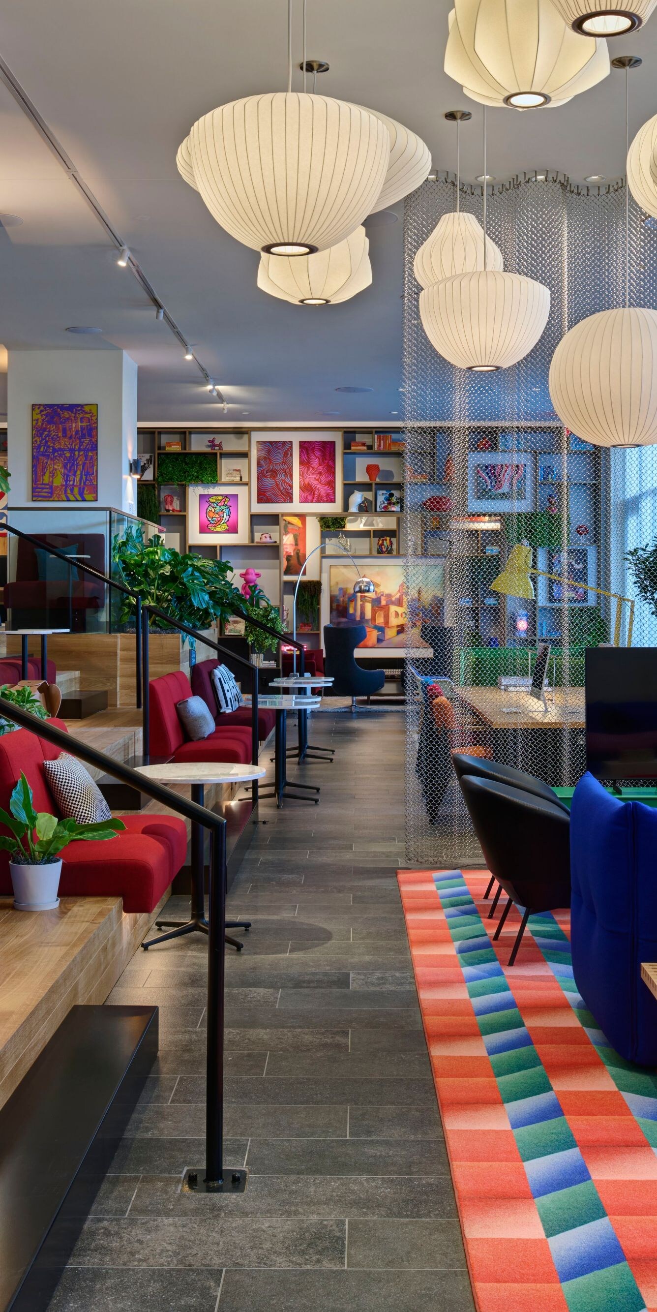 Hotel living room with vibrant furniture 
