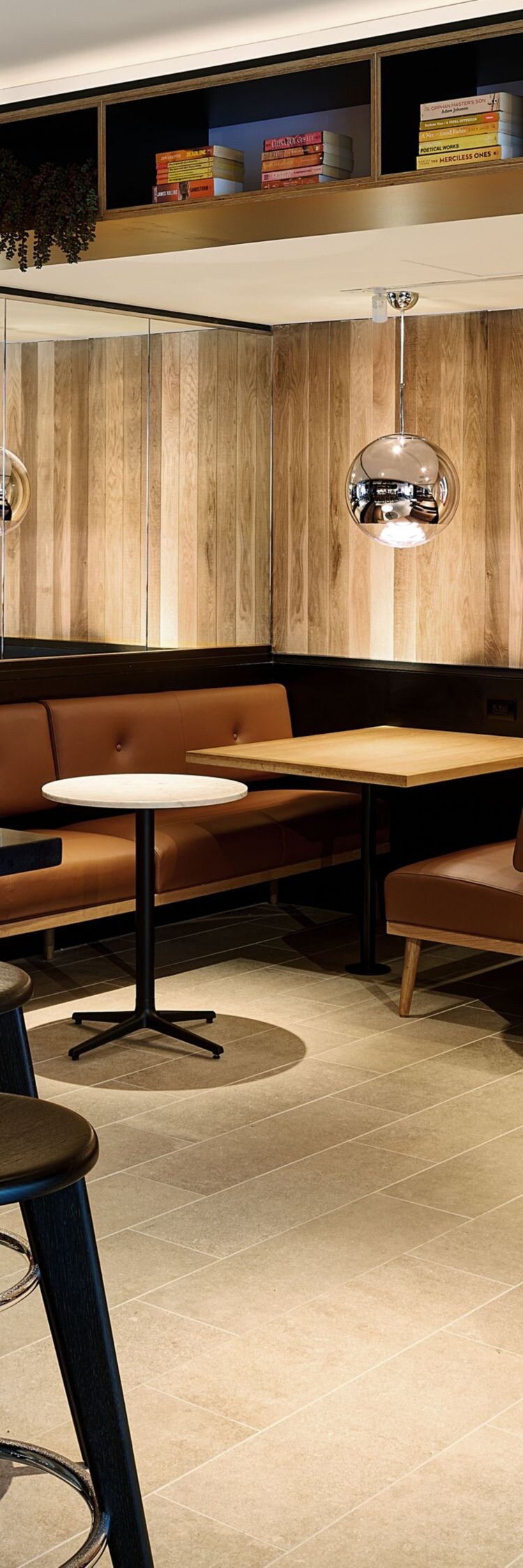 Dining with casual bar stools and booth tables