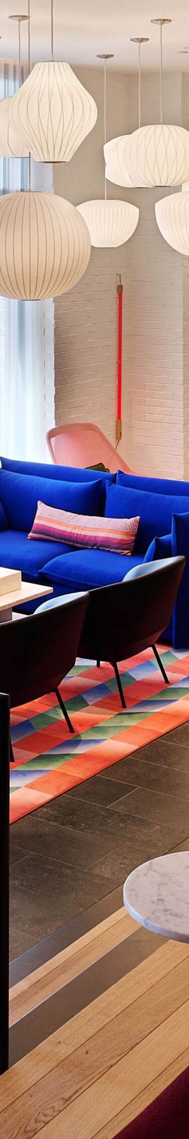 Interior view of hotel living room and workspace