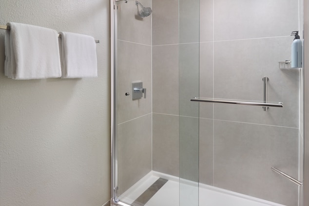 Walk in shower with towel bar