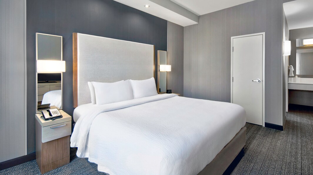 image of bed in king suite bedroom