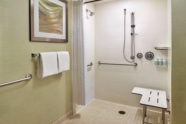 Roll-in shower facility for disabled guests