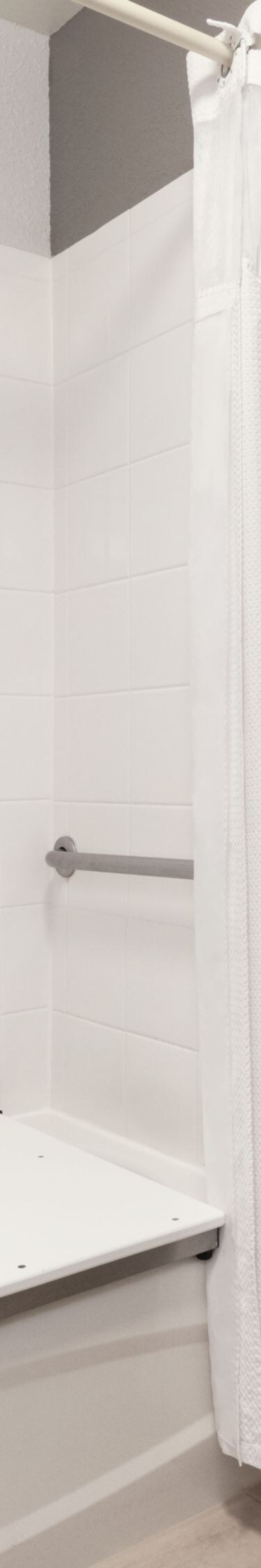 accessible tub with grab bars bathroom