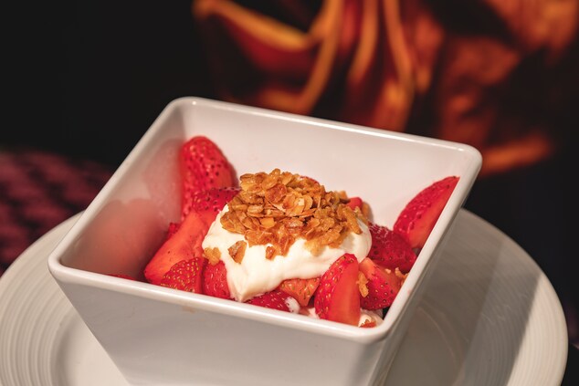 Bowl of yogurt and strawberries 