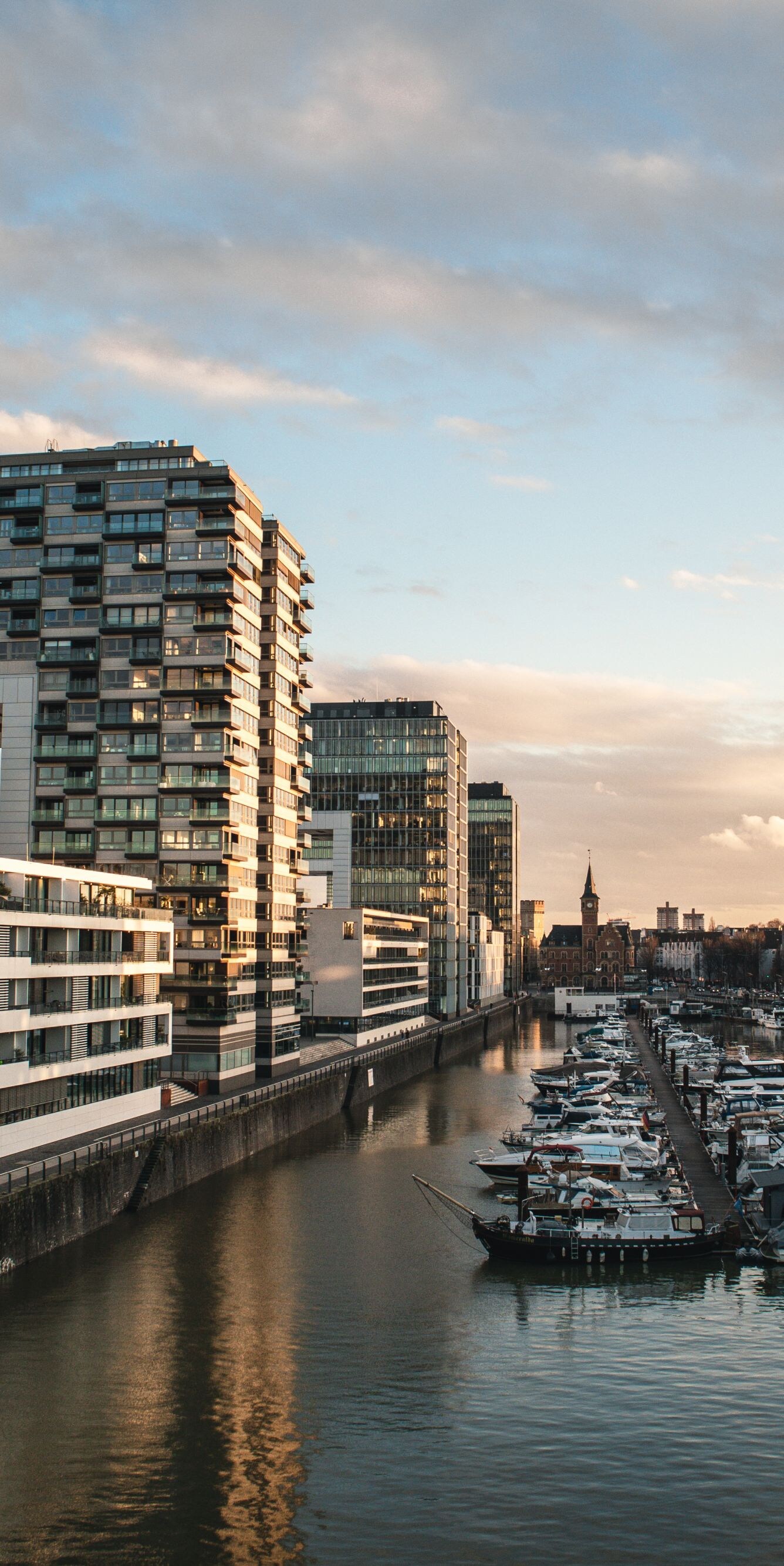 Rhine River with boats and modern buildings