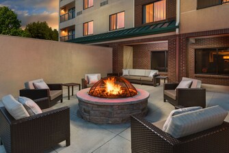 Outdoor patio with fire pit.