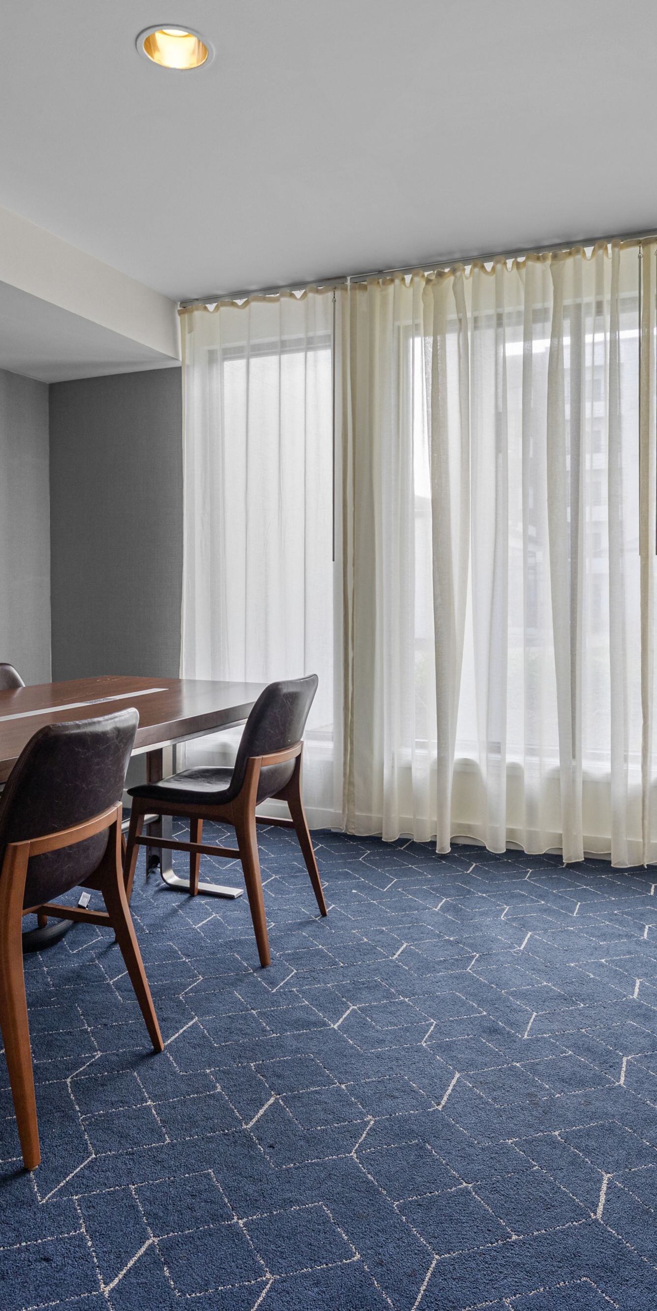 Boardroom with conference table and television