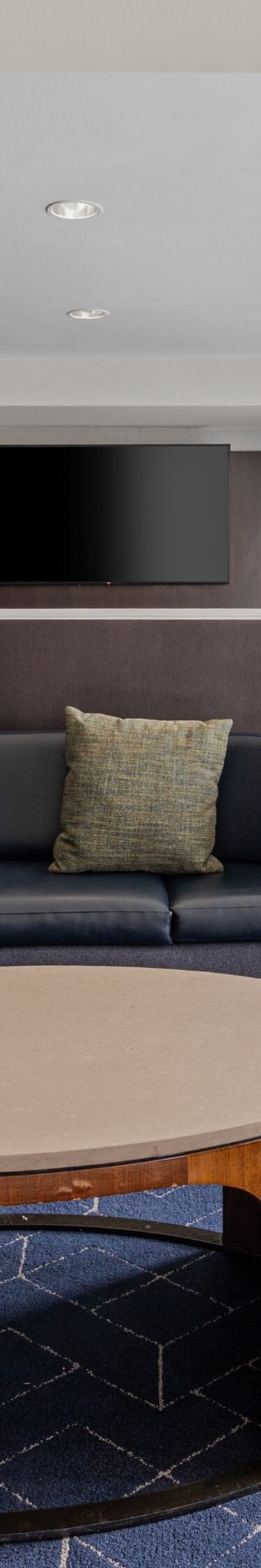 Lobby lounge with sectional sofa and chair