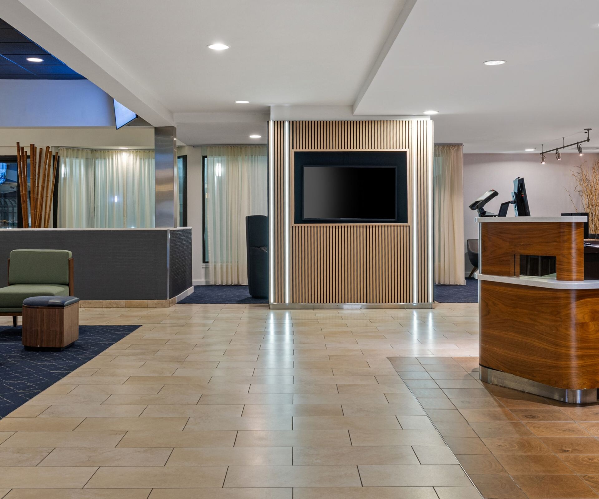 Lobby entrance with front desk and seating