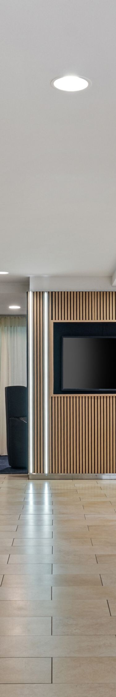 Lobby entrance with front desk and seating