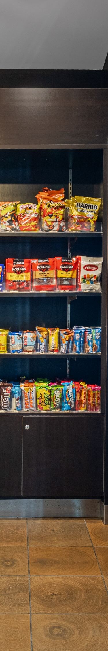 Market shelves stocked with snacks and beverages