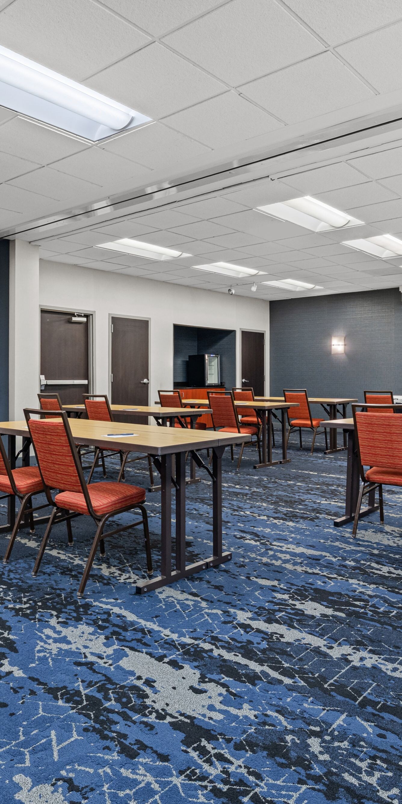 Meeting room arranged with classroom-style seating