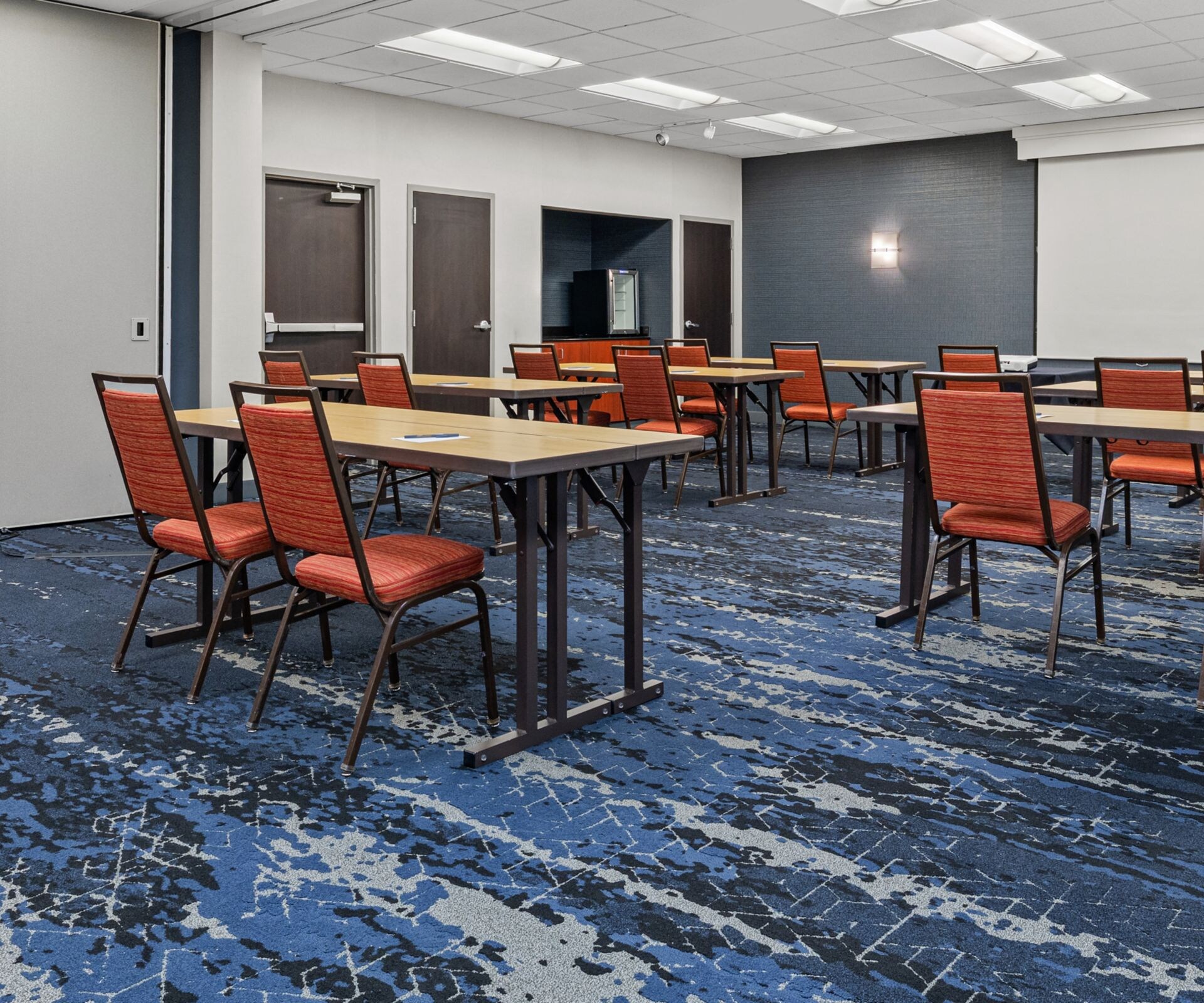 Meeting room arranged with classroom-style seating