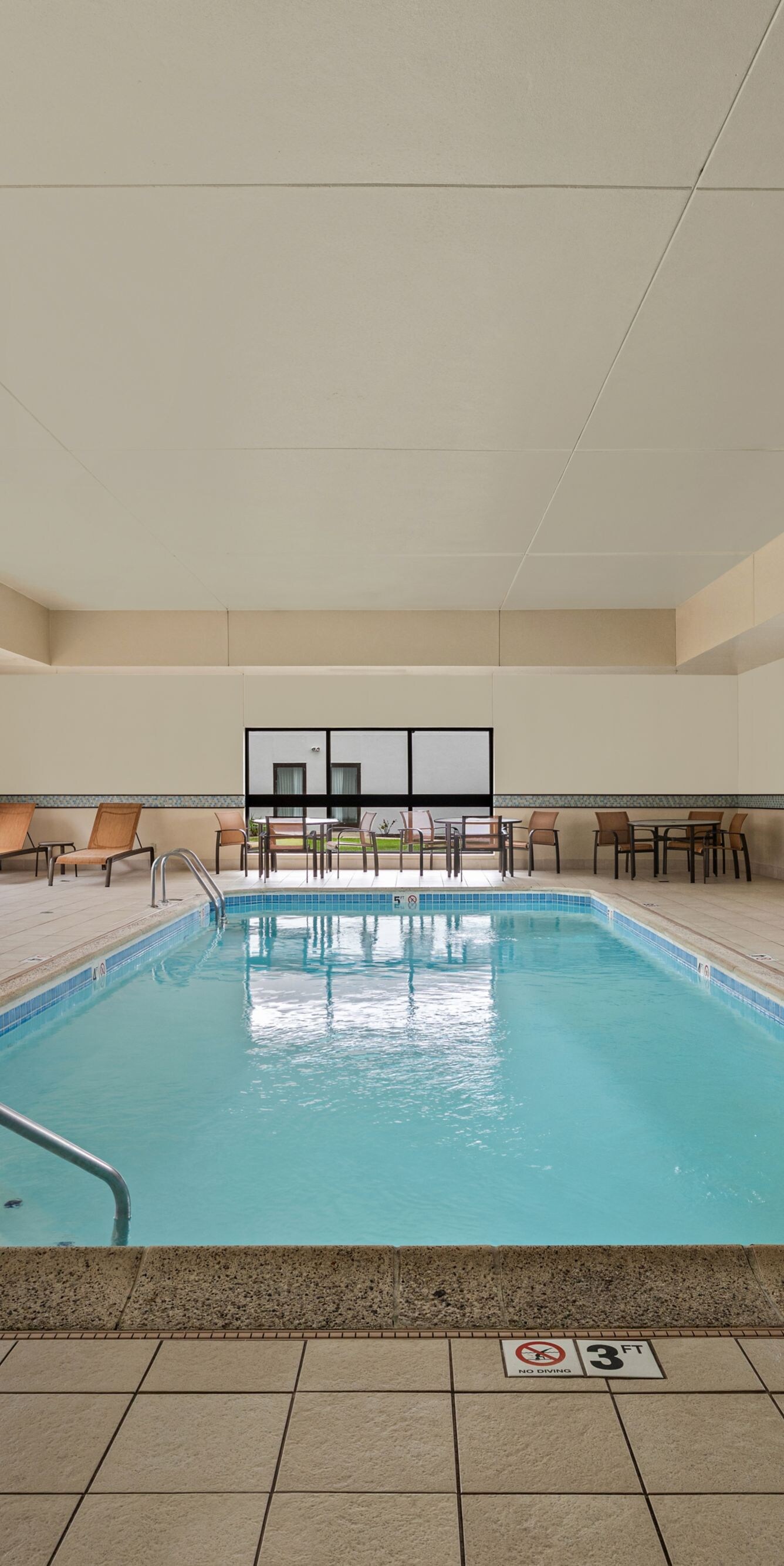Indoor pool with accessible pool lifts