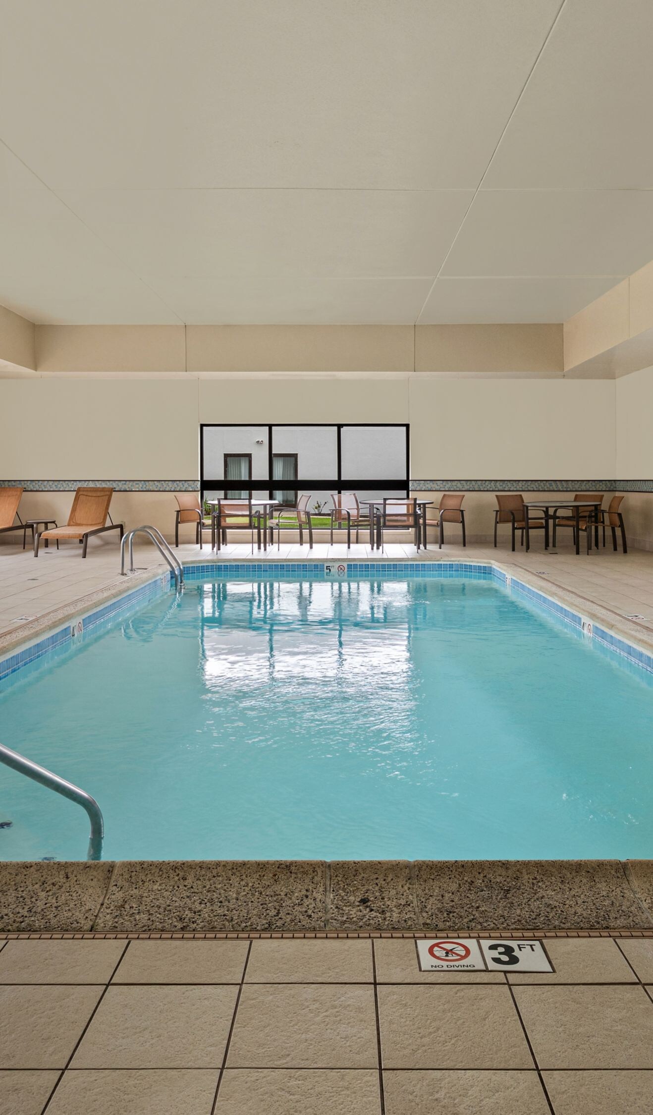 Indoor pool with accessible pool lifts