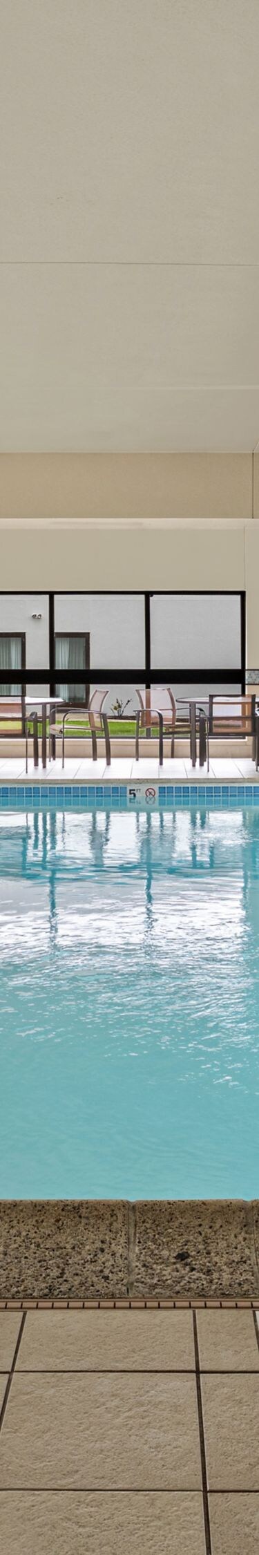 Indoor pool with accessible pool lifts