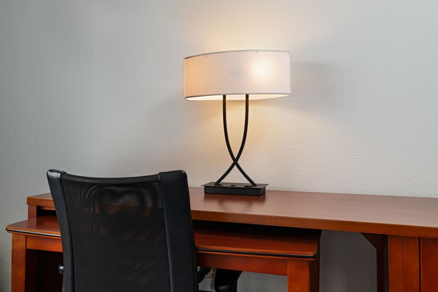 Work desk with lamp and desk chair