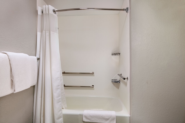 A photo of our bathtub and shower