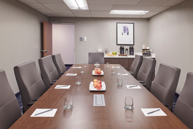 long table, chairs, meeting room, coffee area