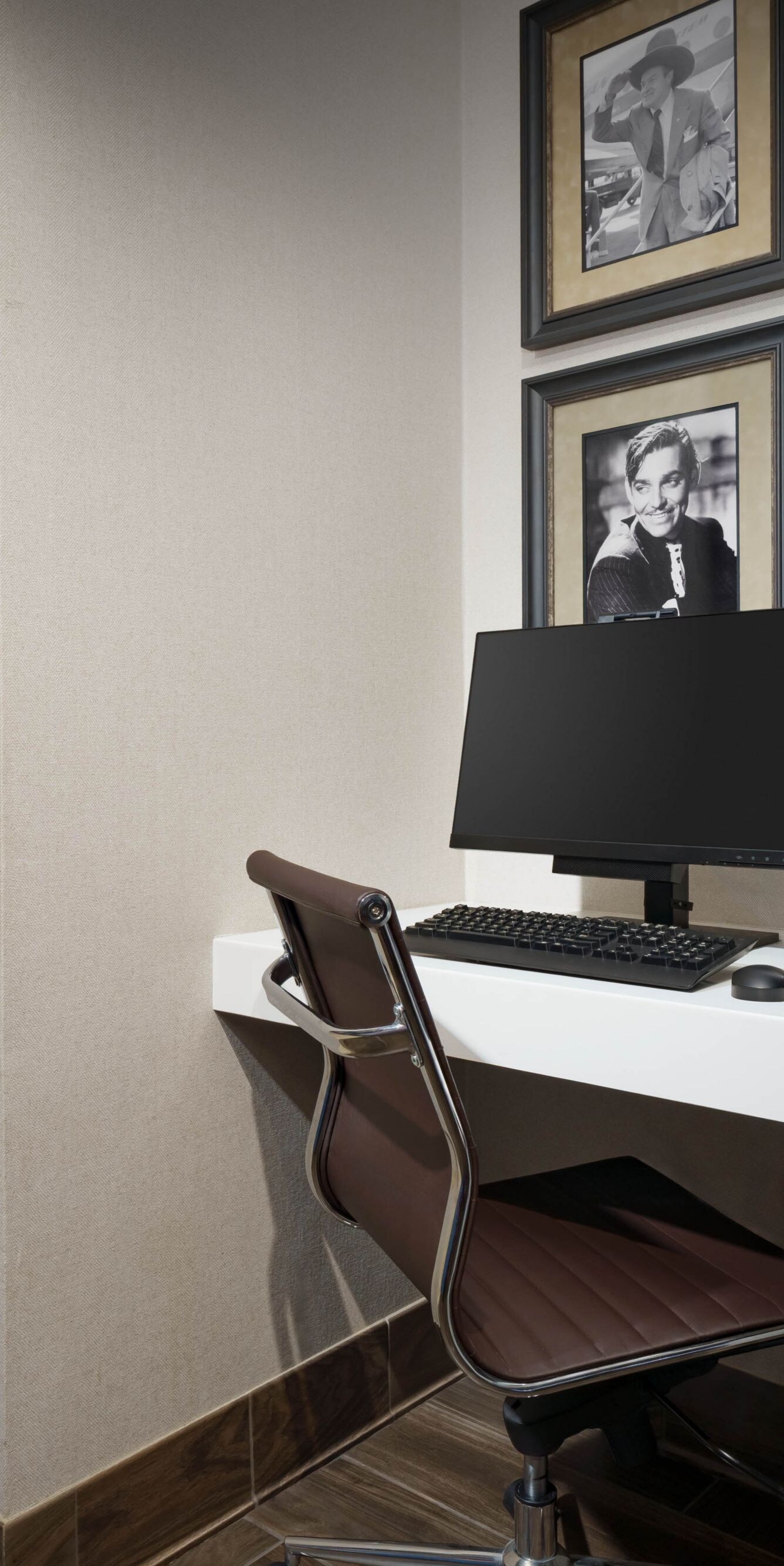 A computer workstation near a staircase.