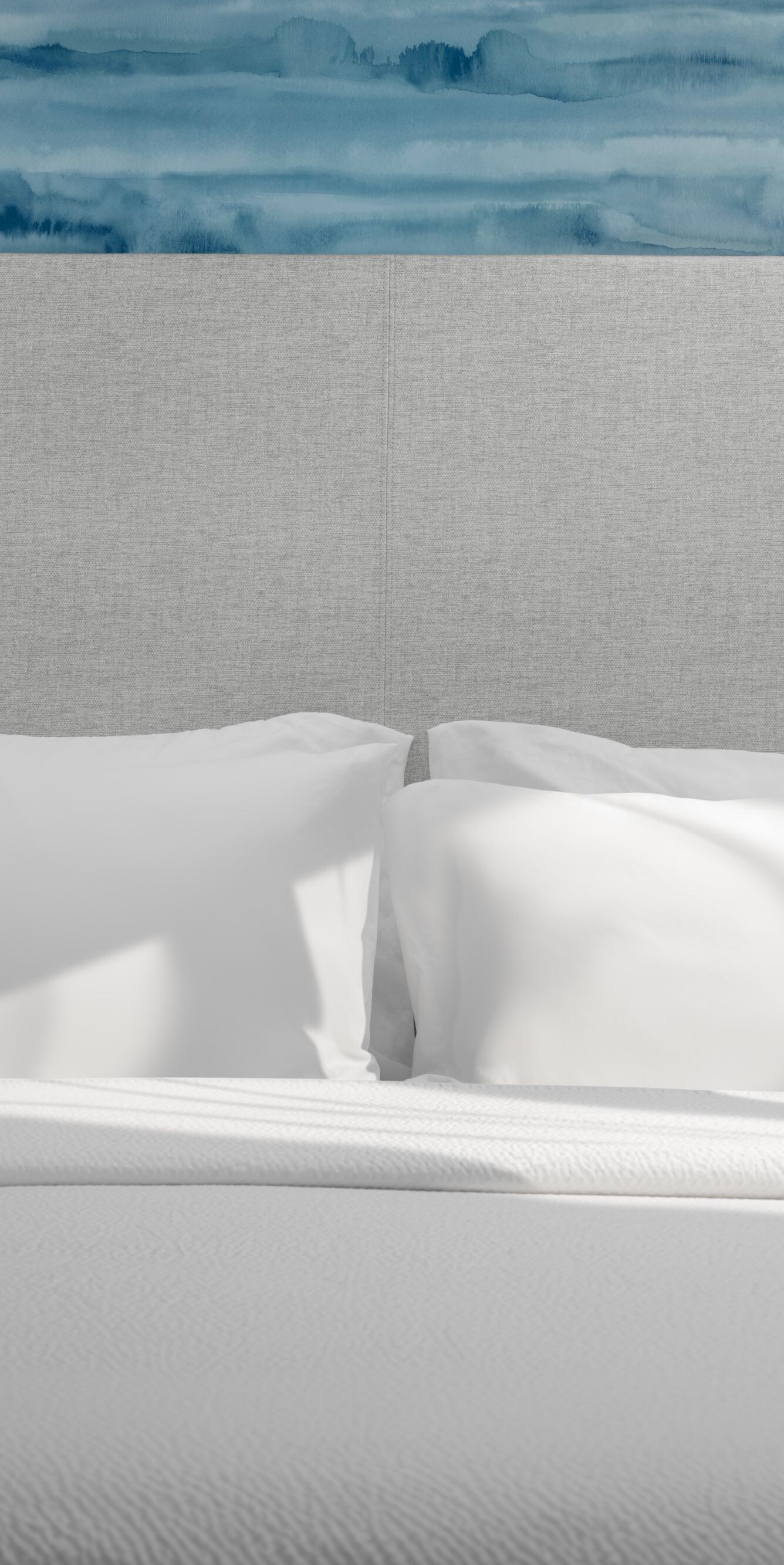 King bed with blue accent wall