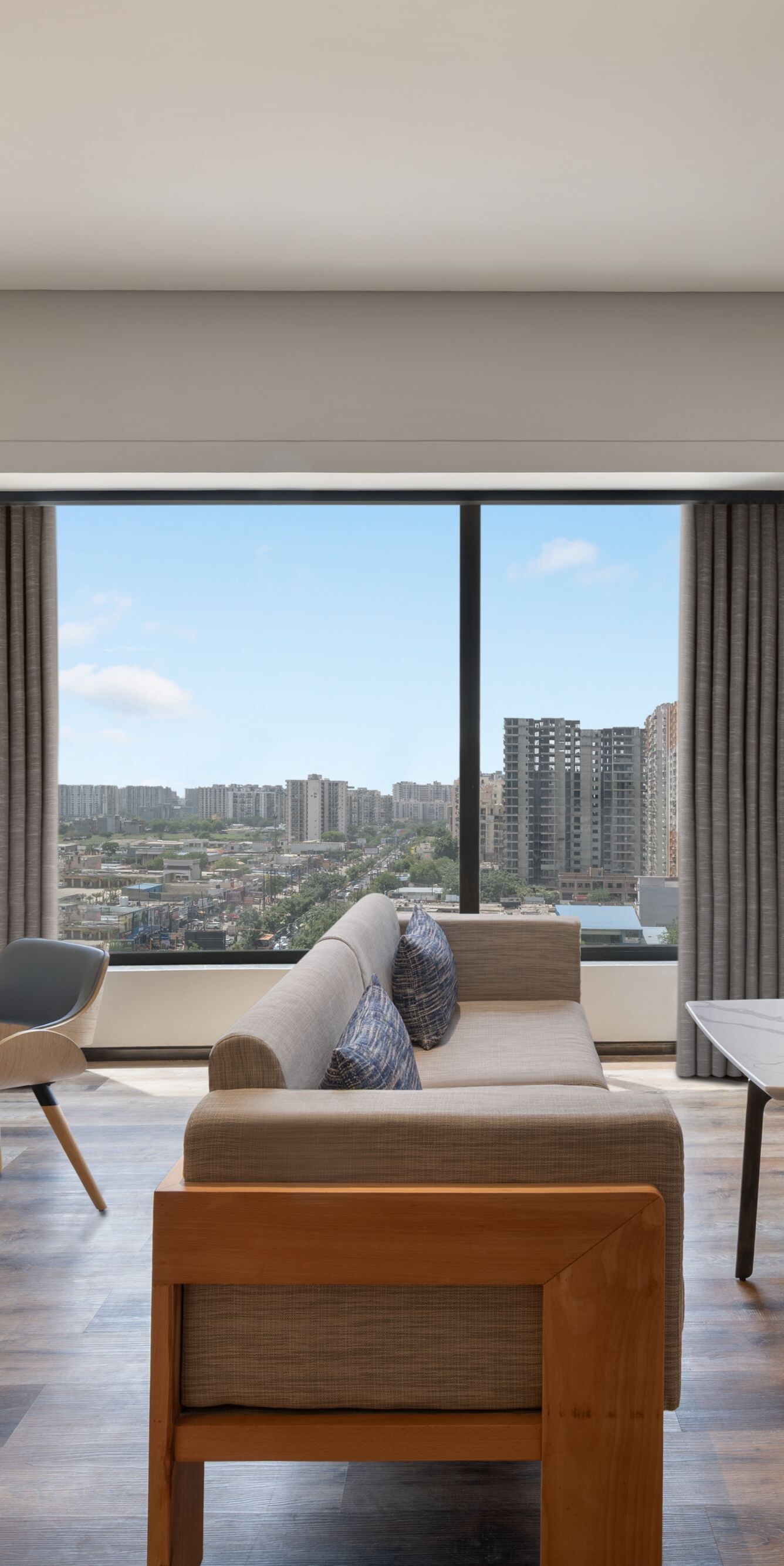 Suite living area with a sofa and dining table.