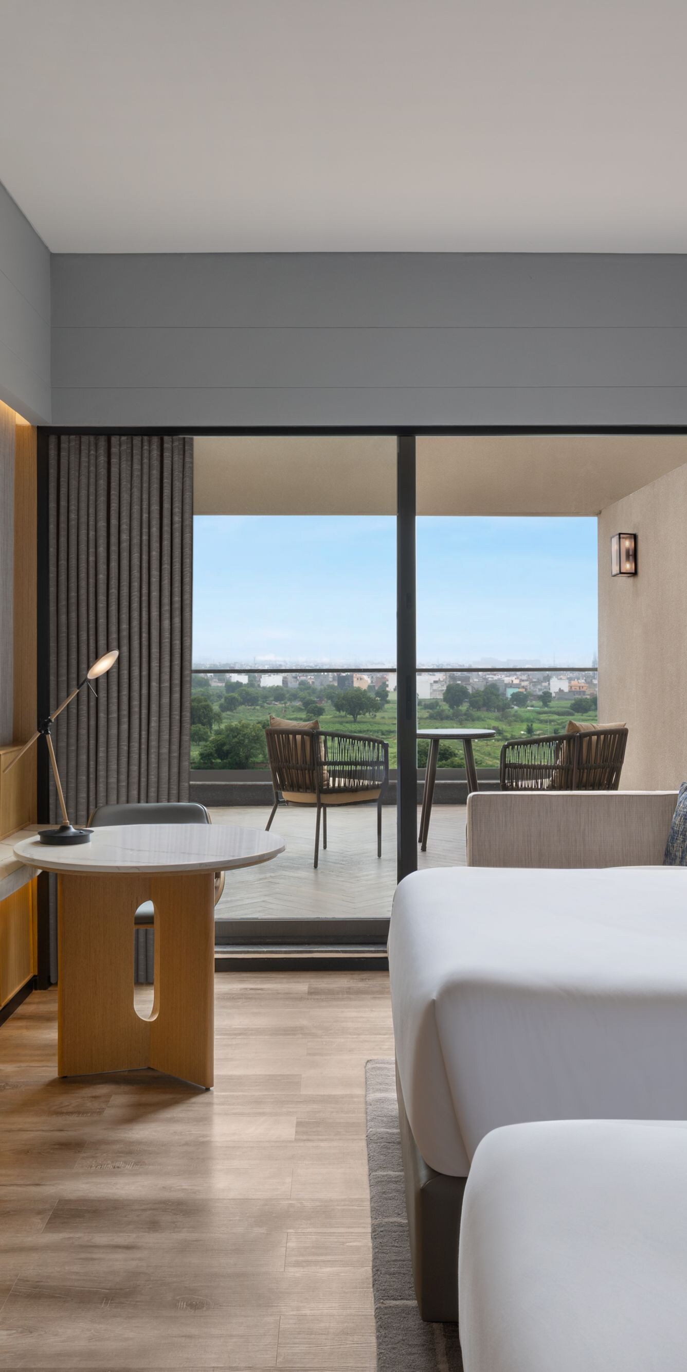 Guest room with two twin beds and terrace.