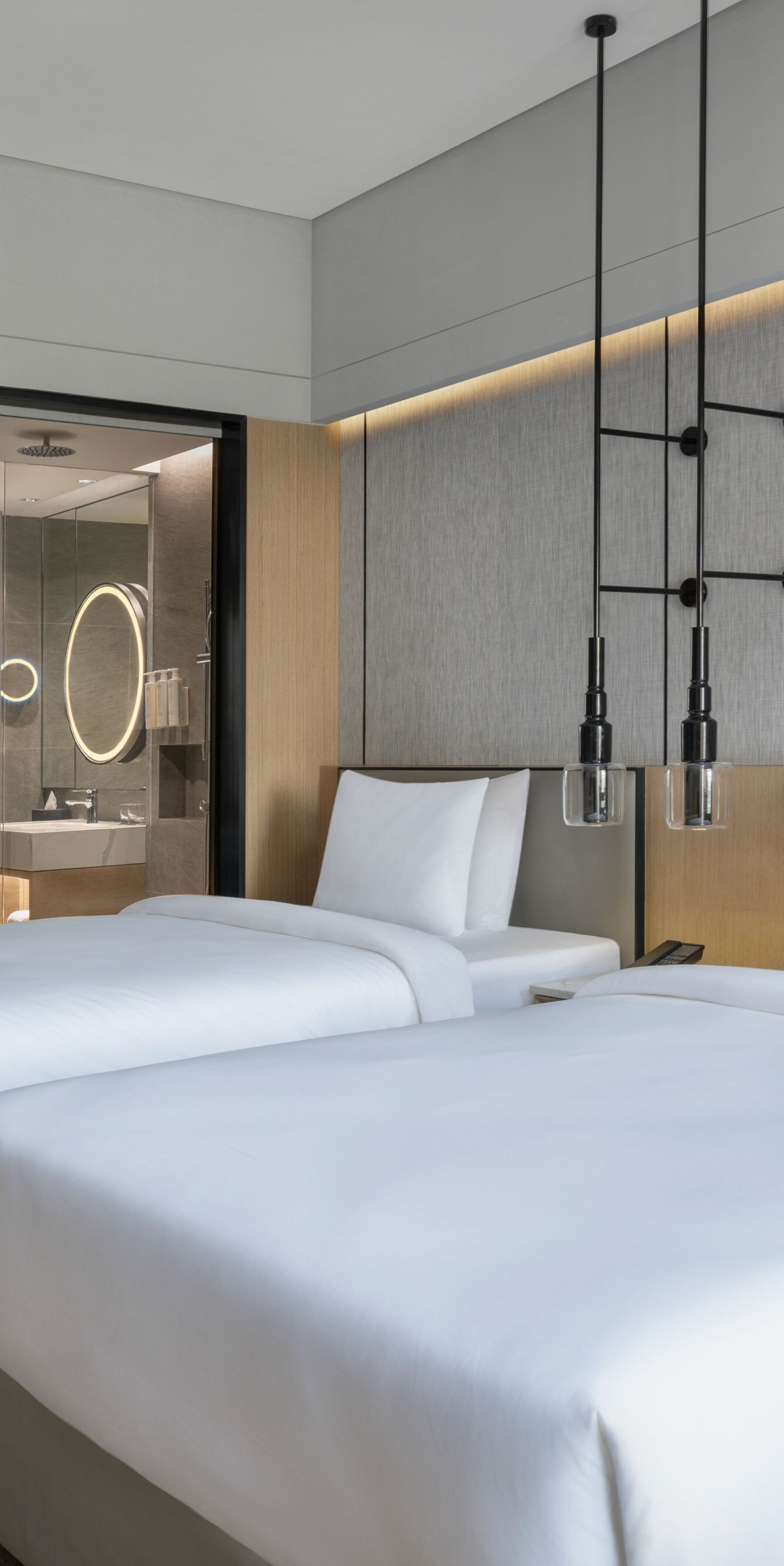 Guest room with two twin beds and terrace.