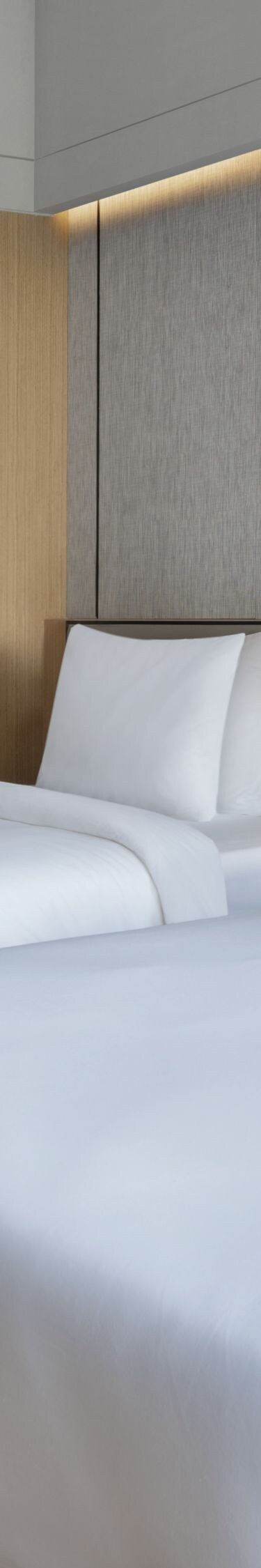 Guest room with two twin beds and terrace.