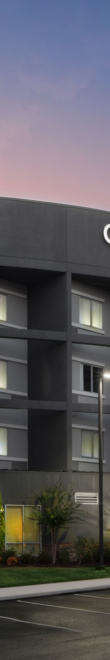 Courtyard hotel exterior at dusk