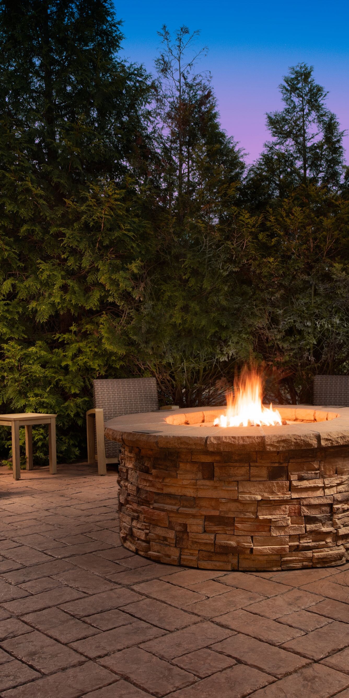 Courtyard outdoor fire pit at night