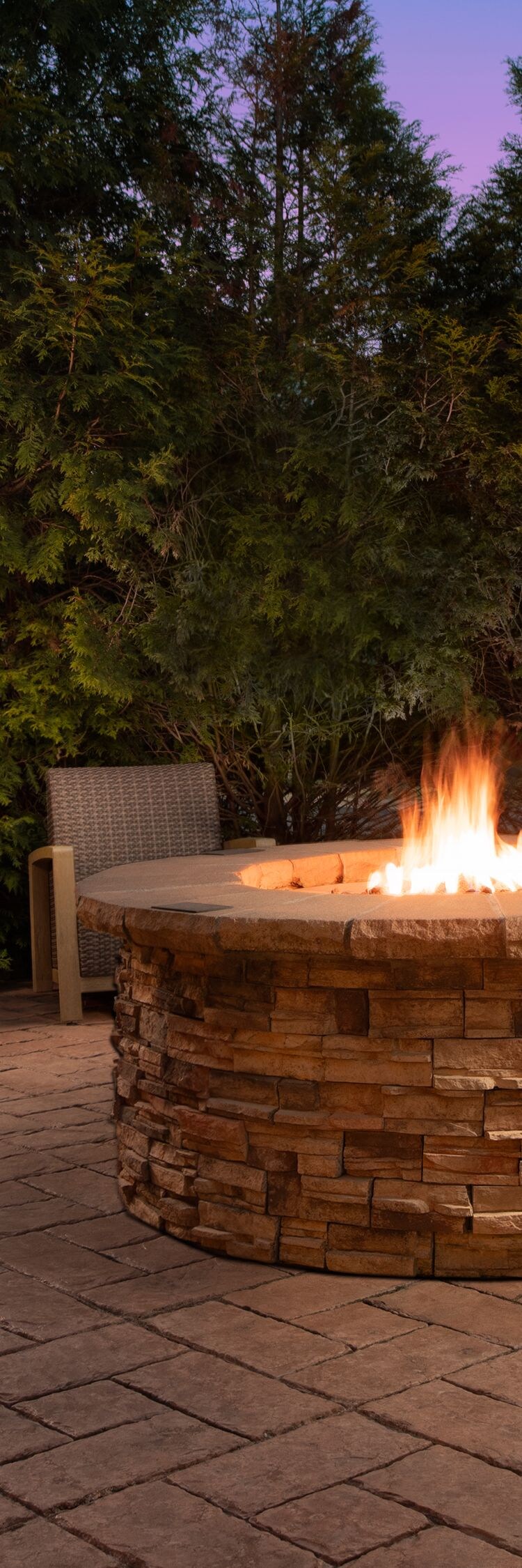 Courtyard outdoor fire pit at night