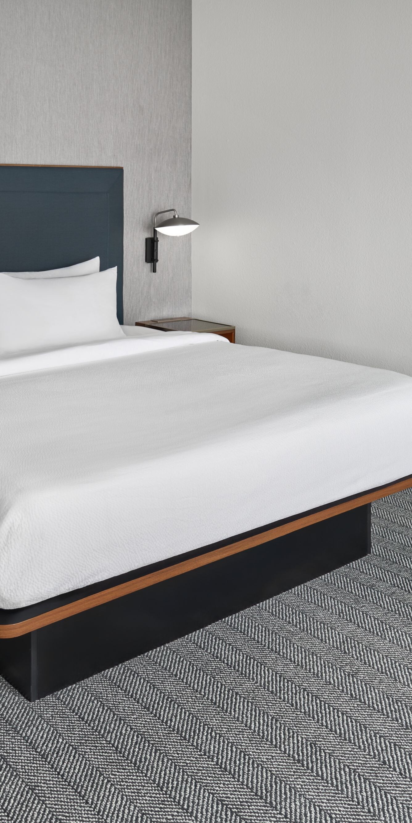 king bed, nightstand, couch, and lamp
