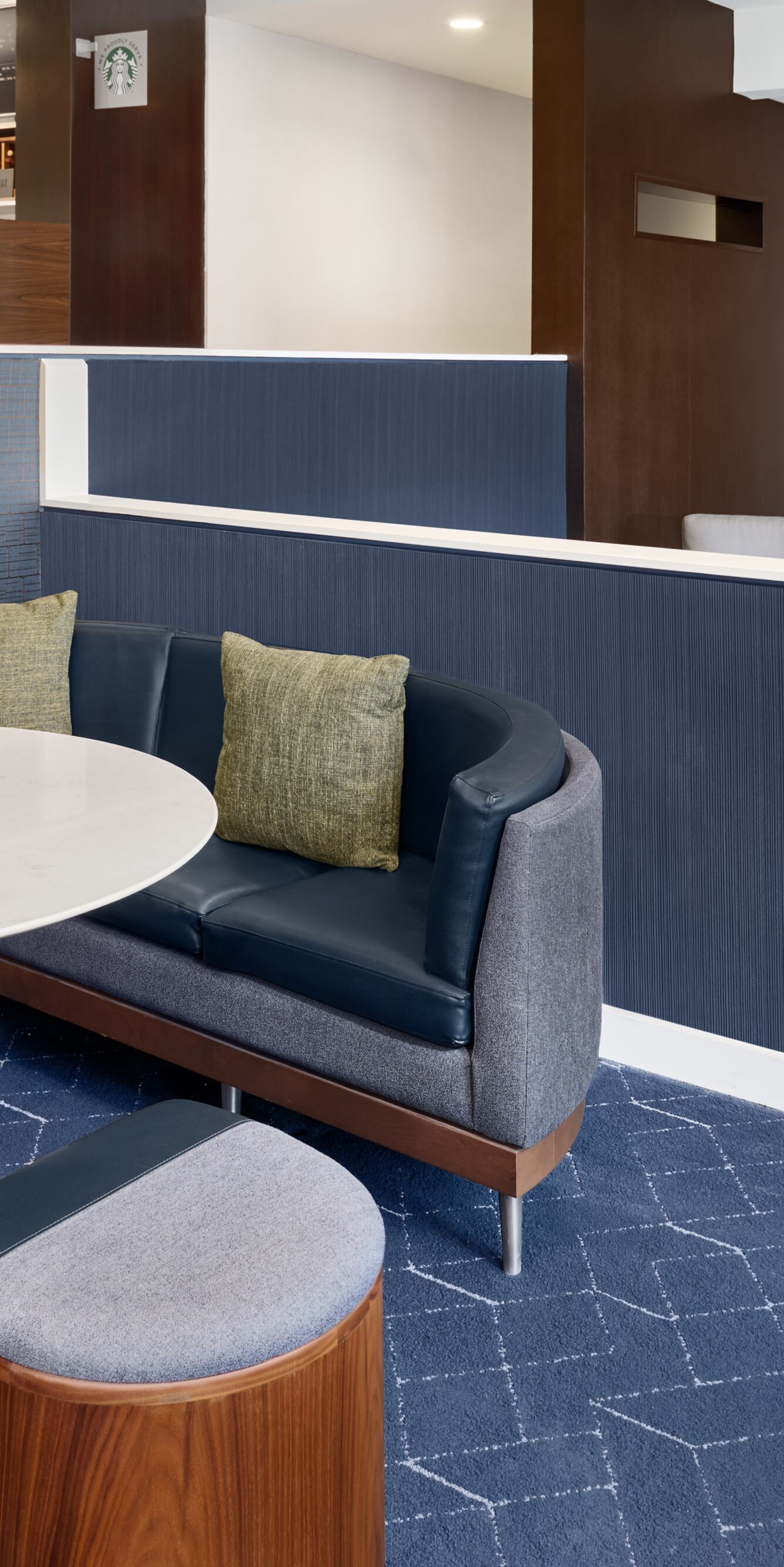 Curved booth seating with round table