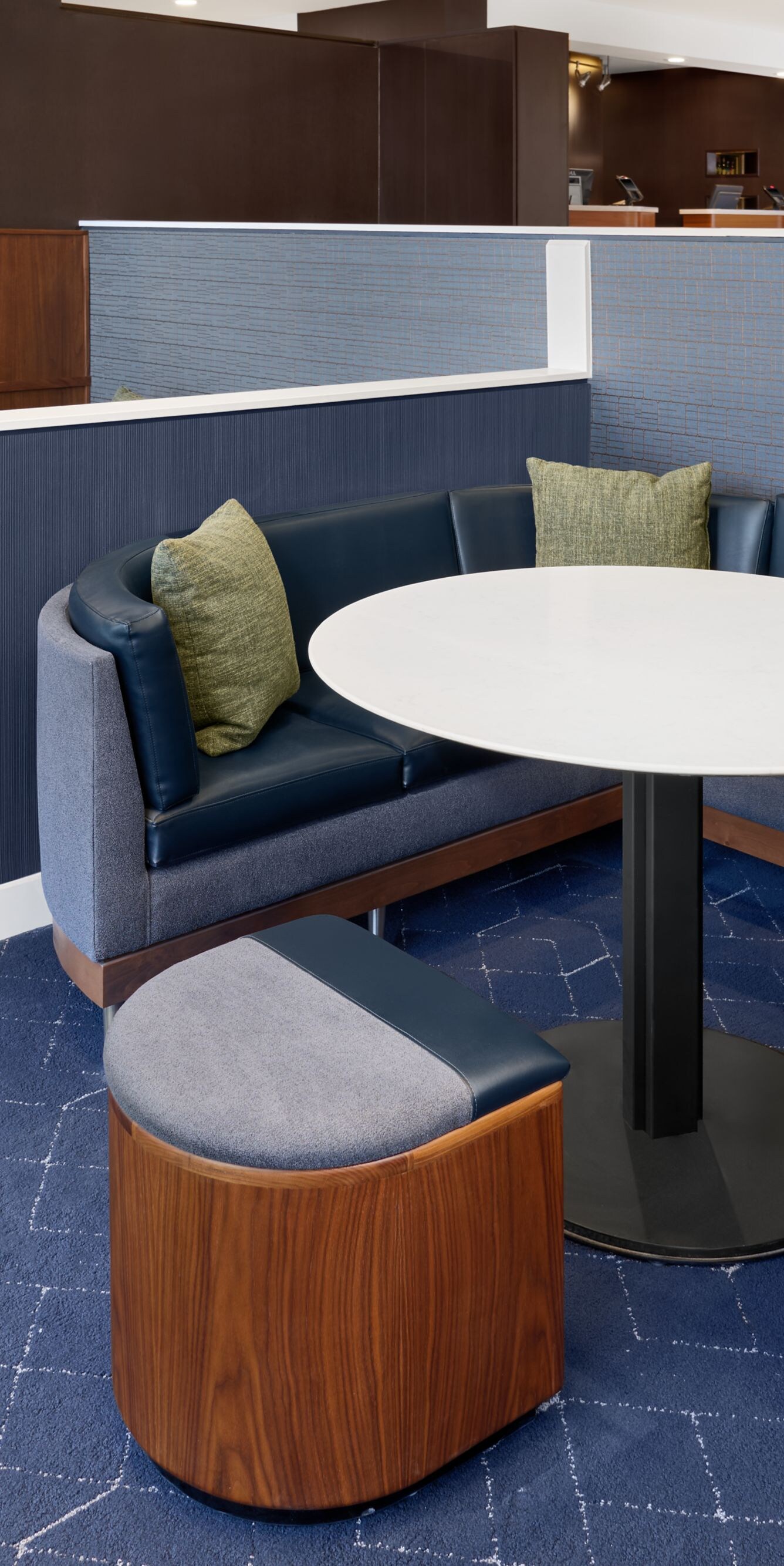 Curved booth seating with round table 