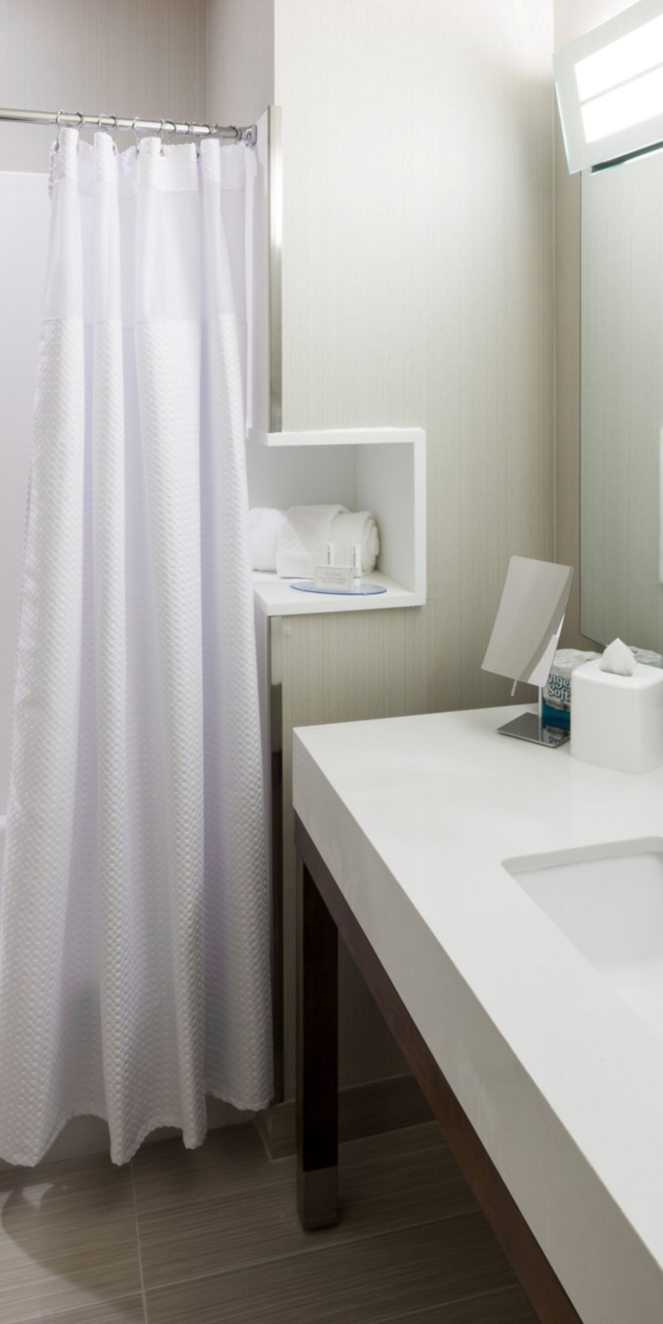 Shower/tub with vanity