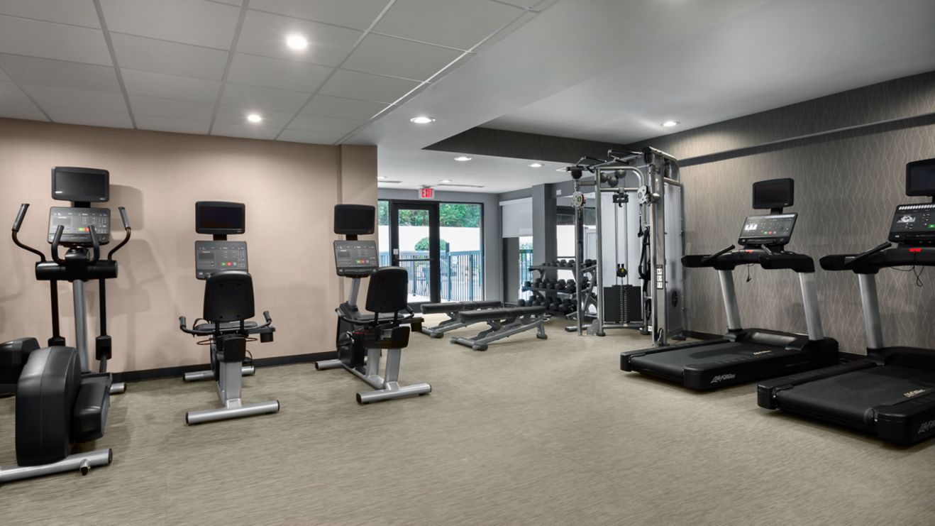 Fitness Center with treadmills and weight machines