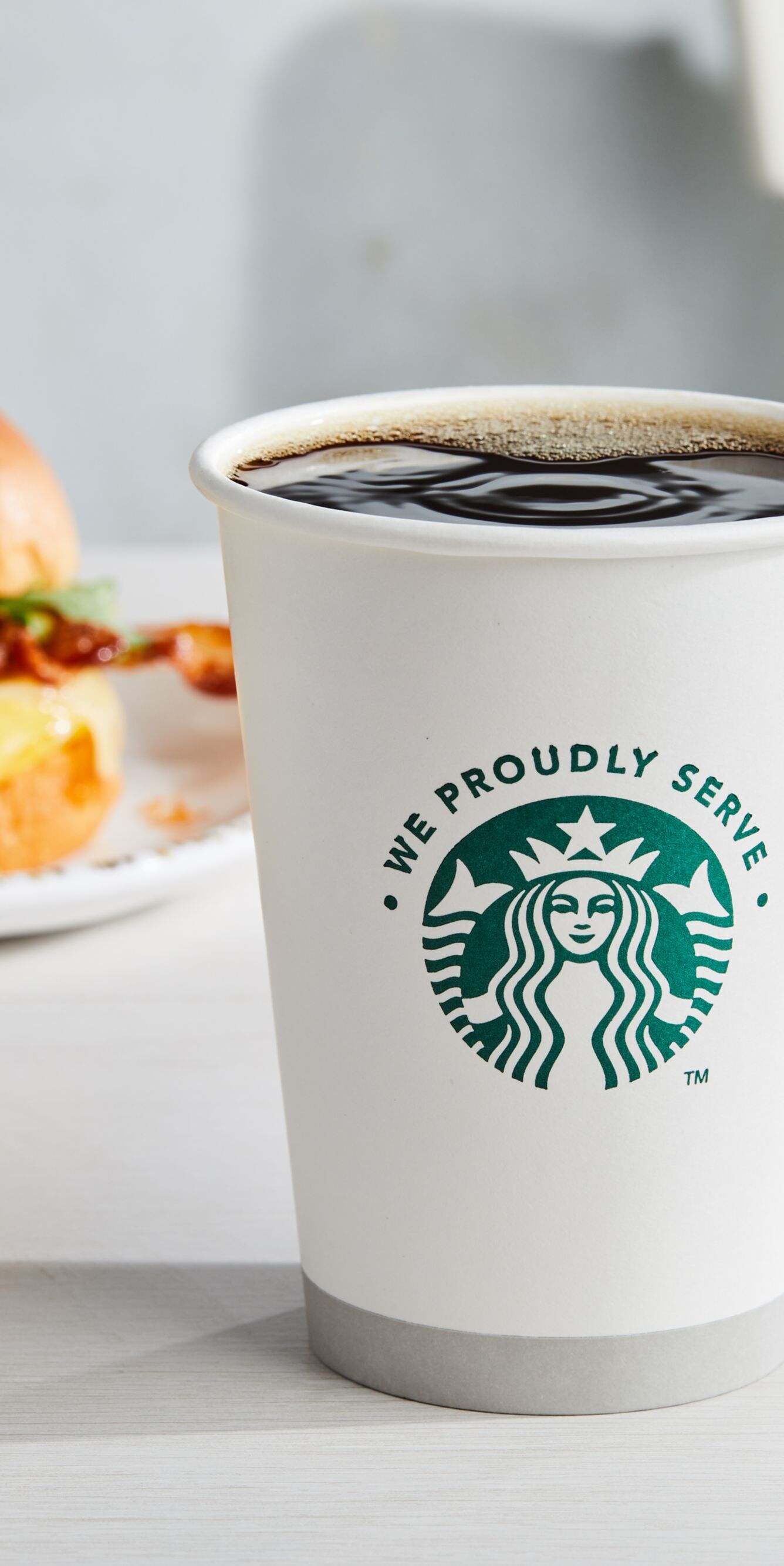 egg sandwich with a coffee