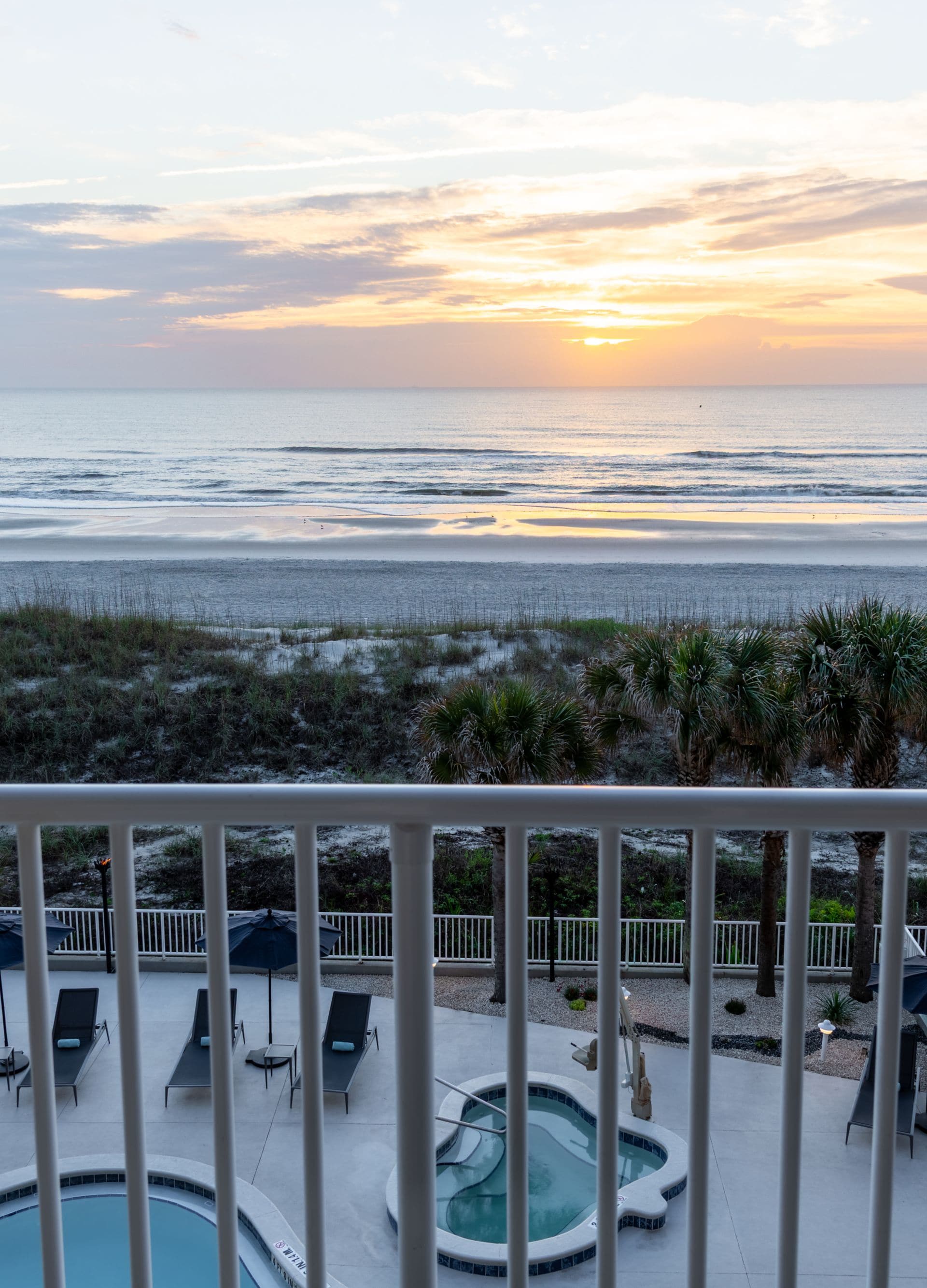 view of sunrise off guestroom balcony