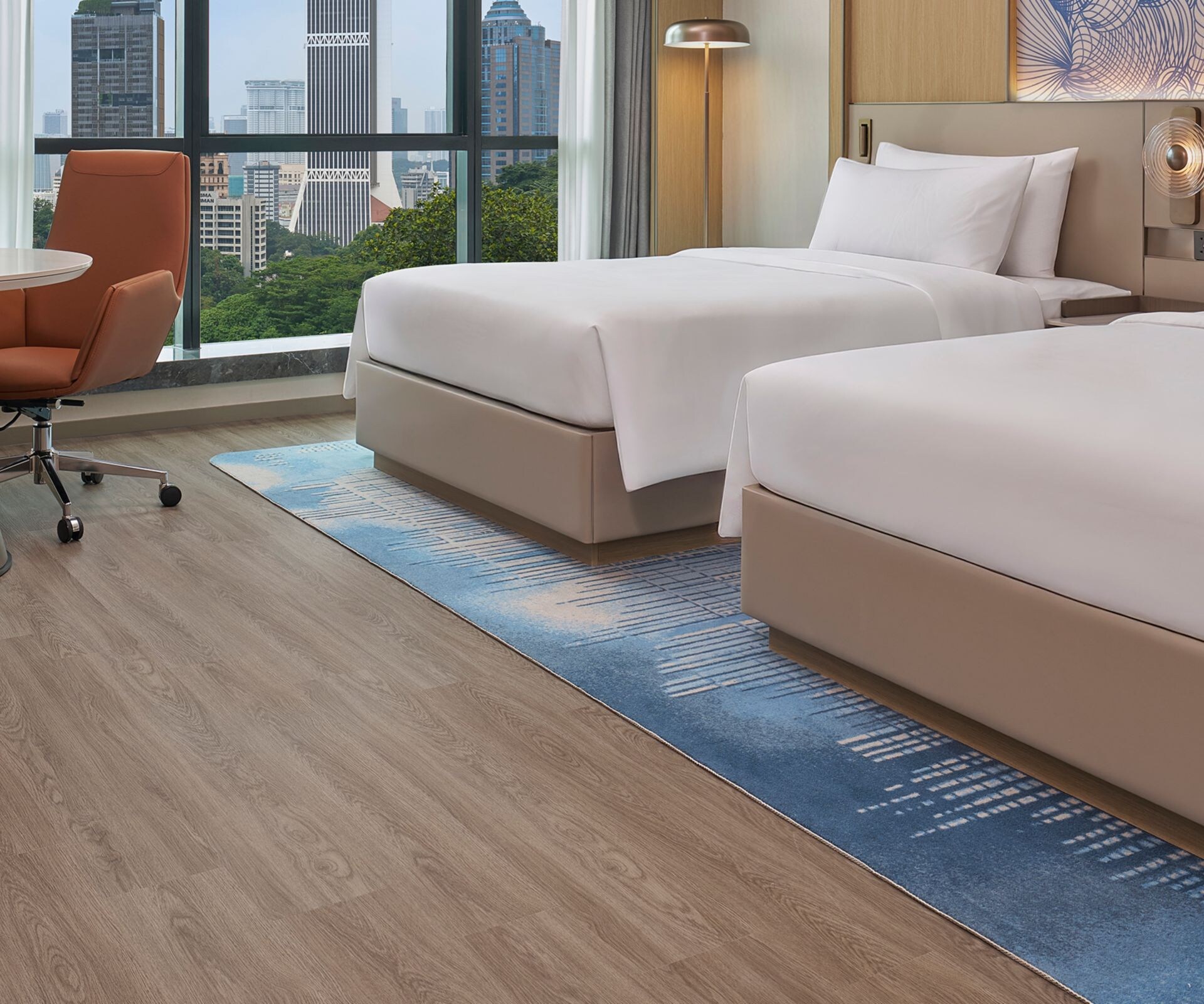Two-bed guest room with city view