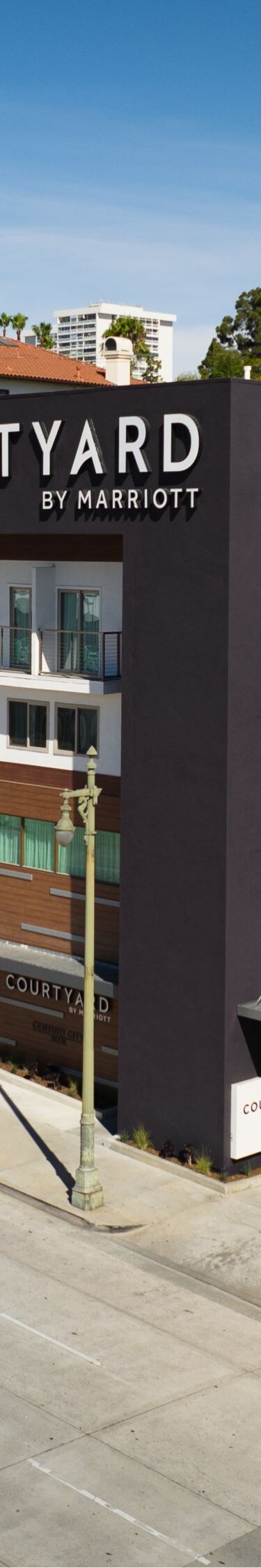 Hotel building exterior with blue skies 