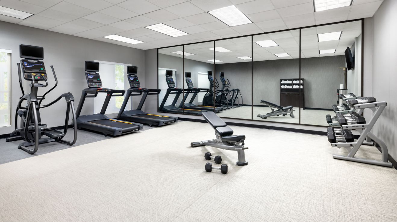 Fitness Center - Treadmill free weights 