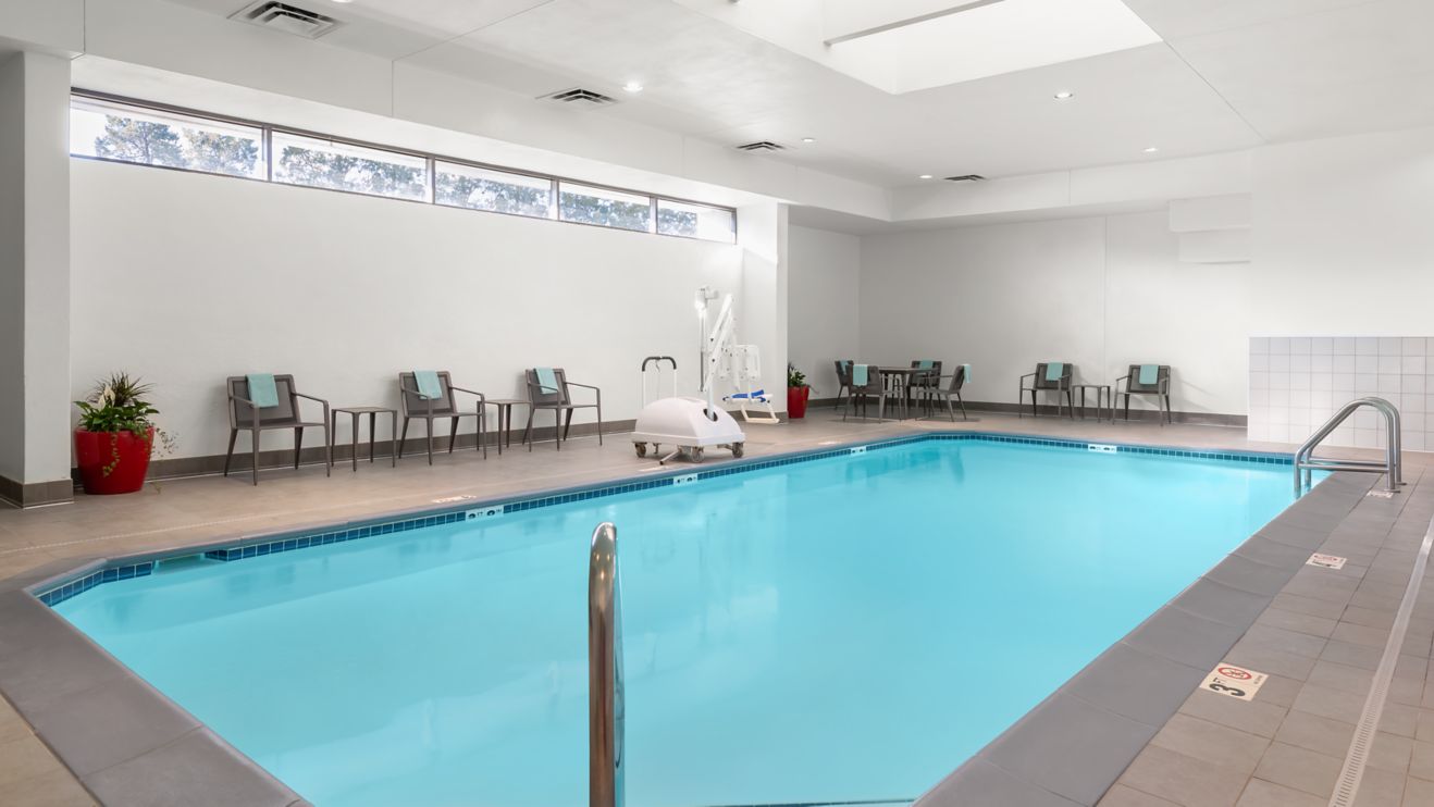 indoor pool, chairs, swimming pool