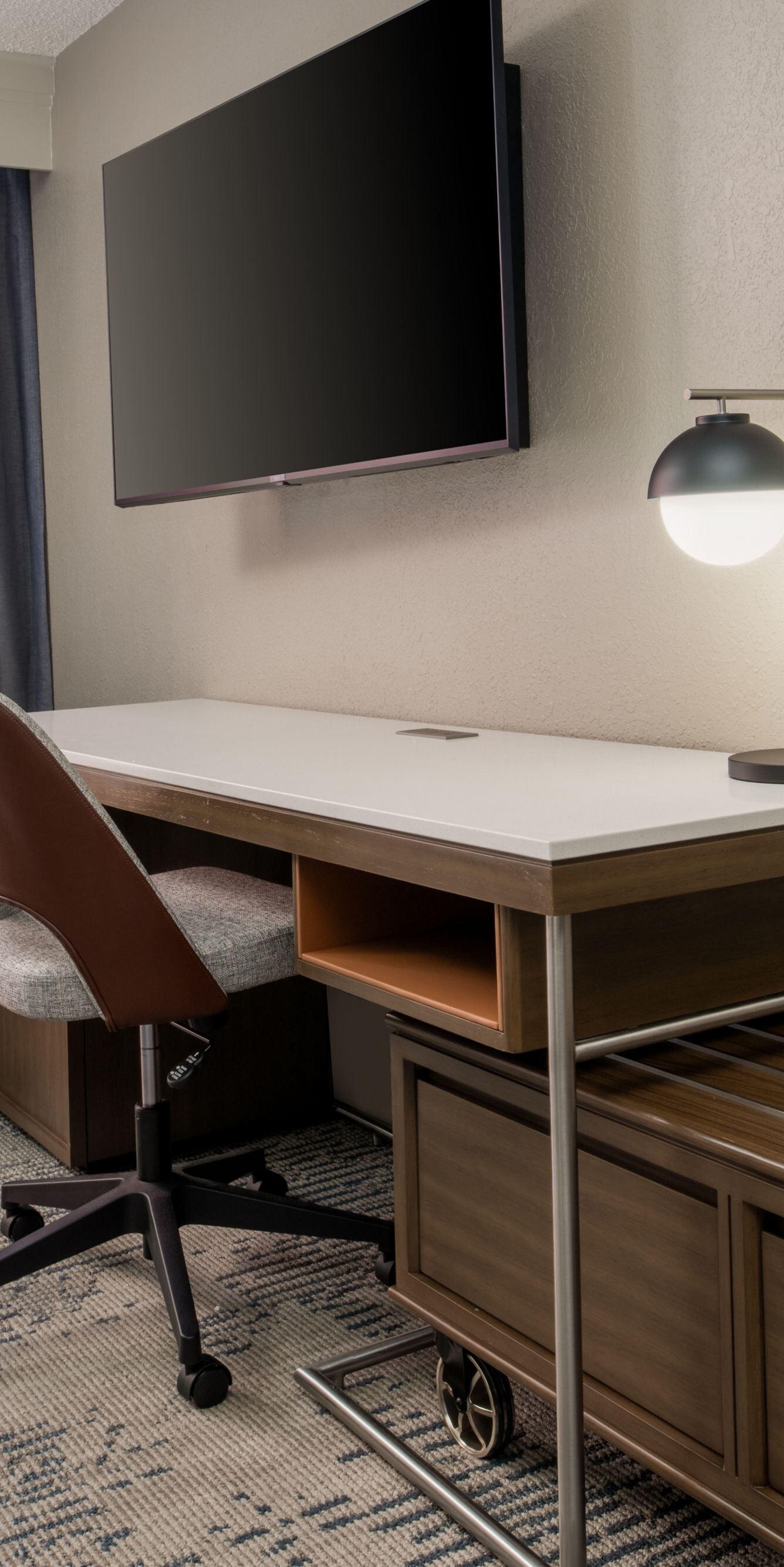 Work desk with chair and TV